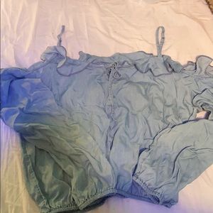 cute baby blue crop top. off the shoulders.